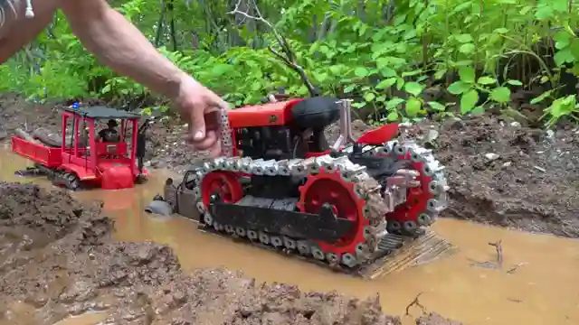 off-road-rescue-rcsparks-studio-frees-stranded-tractor-with-two-wheel-drive-truck