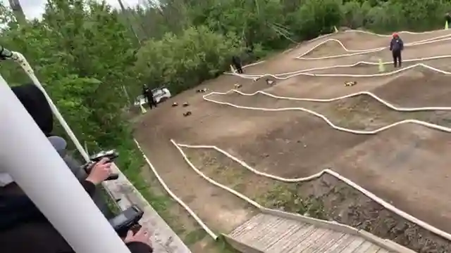 netcruzers-thrilling-truggy-race-blue-tires-split-mains-and-victory